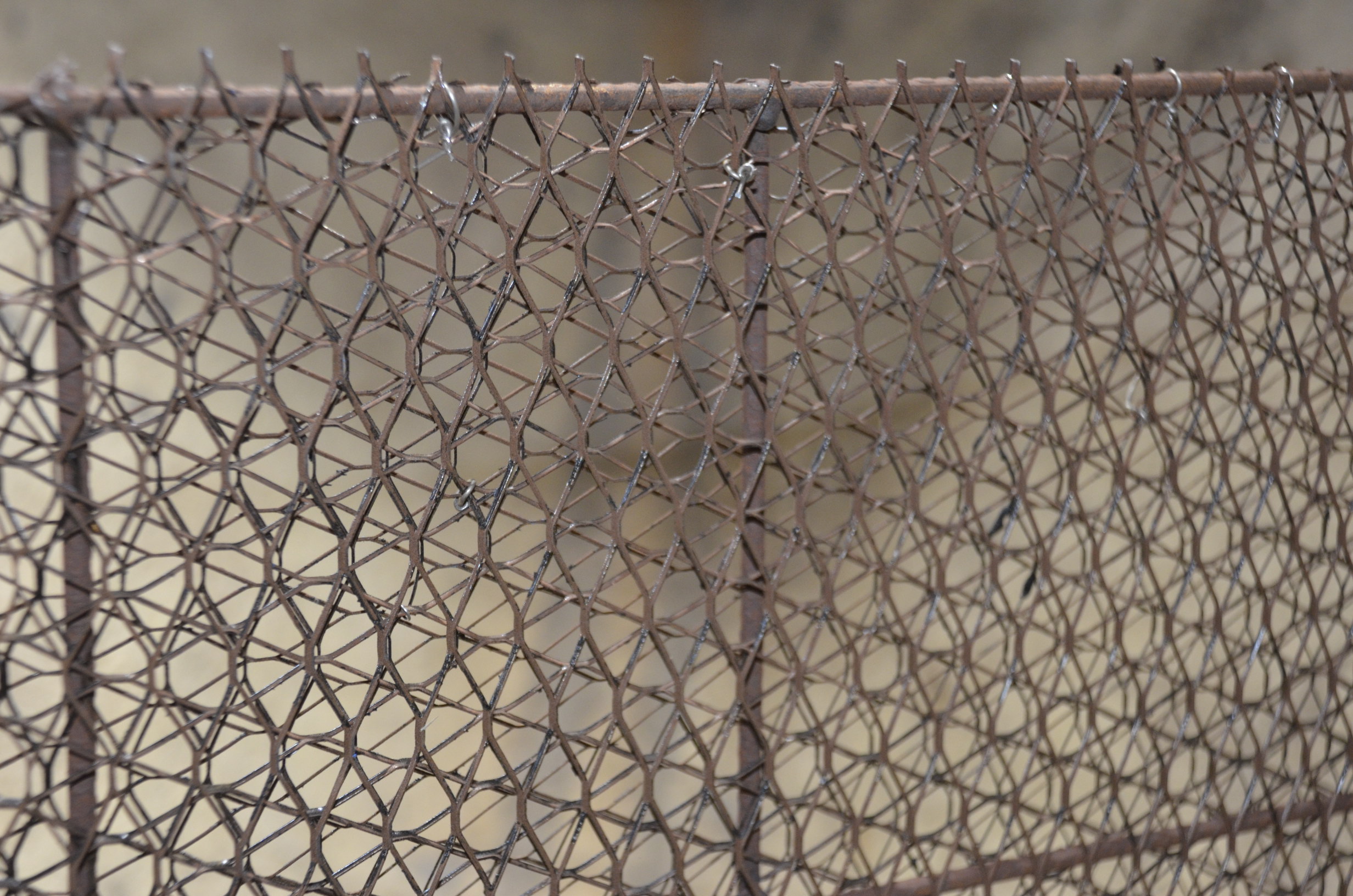 Closeup of the armature, made of expanded steel in four layers, two of which are embedded within the welded framework which is welded 5/32