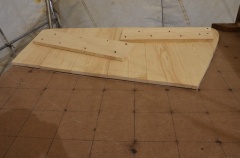 Mold placed on with shelf edge on edge of plywood and traced